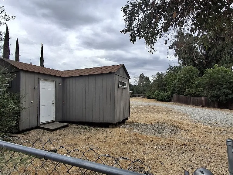 commercial building located behind house