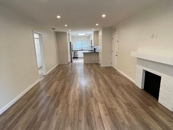 LIVING ROOM LOOKING INTO KITCHEN