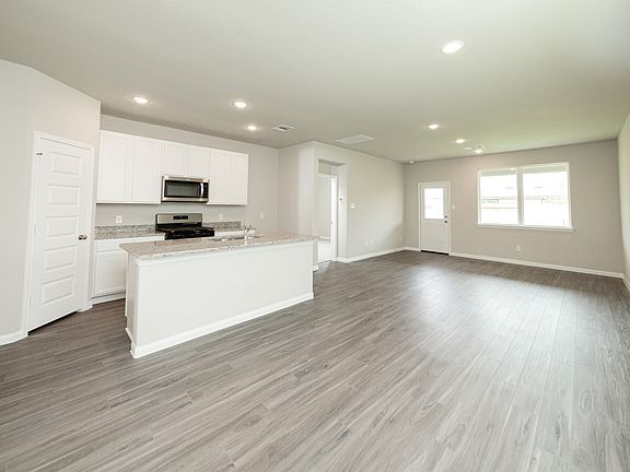 Dining Area to Kitchen and Family Room