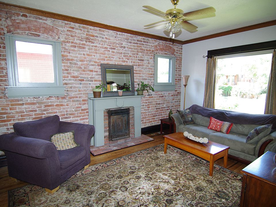 Exposed Brick & Fireplace!