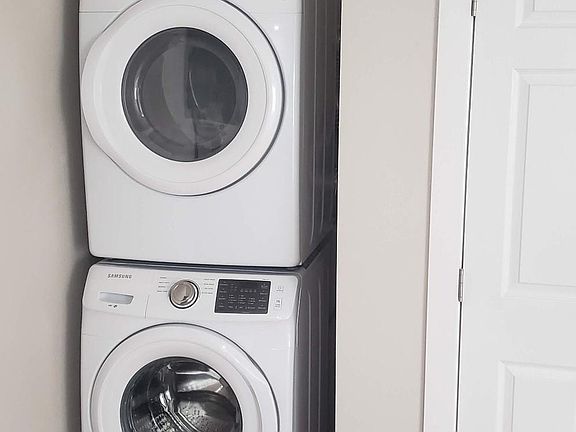 Washer dryer next to restroom