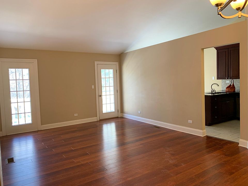 Living area with balcony deck outside