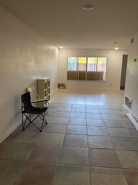 Liv-Din area view toward enclosed back patio (gated)