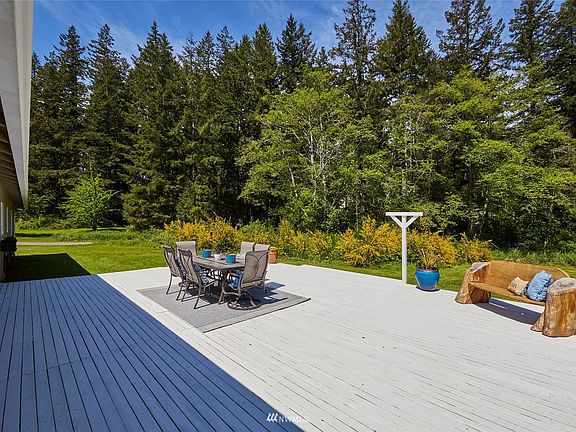 Huge back deck, just painted and great for entertaining. 
