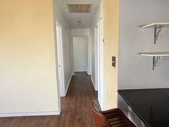 Hall to 3 bedrooms