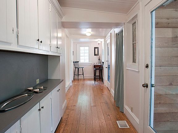 This where the entry to the apartment is. It was once the service porch for the house.