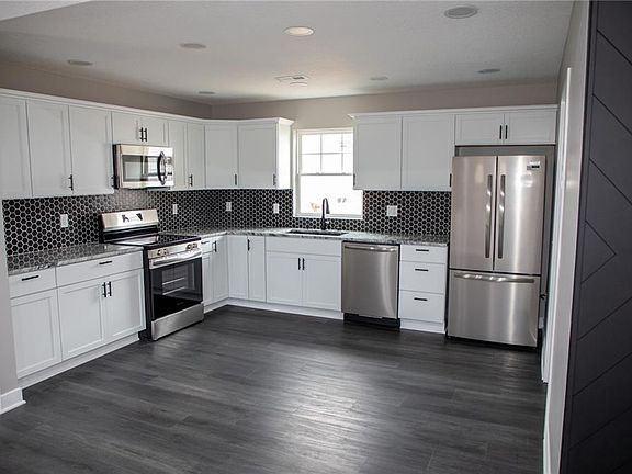 3rd image of 10809 E 58th St