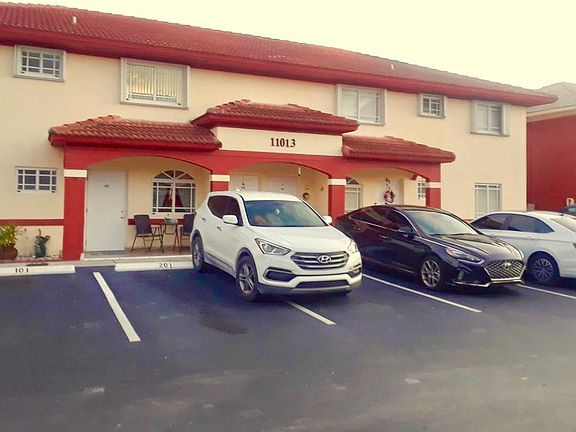 2 CARS PARKING AT THE ENTRANCE DOOR AND PLENTY VISITOR PARKING