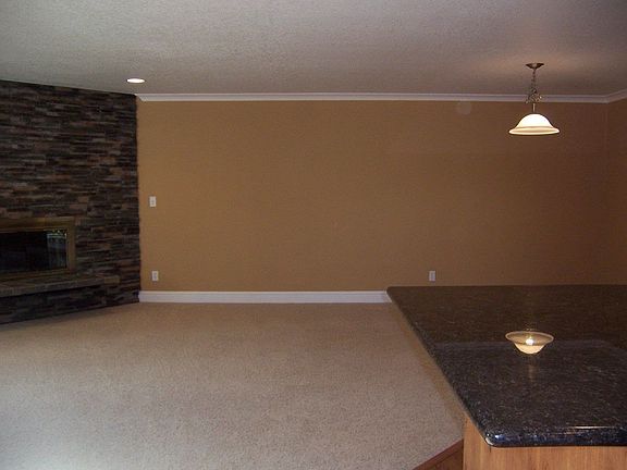 Family Room #1 Upstaris with Stone Floor to Ceiling Fireplace