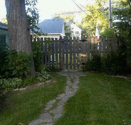 Pleasant garden area transition to backyard.