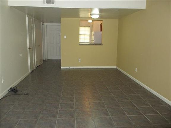 Living/dinning area with fresh custom paint.