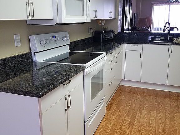 KITCHEN W/ GRANITE COUNTERS