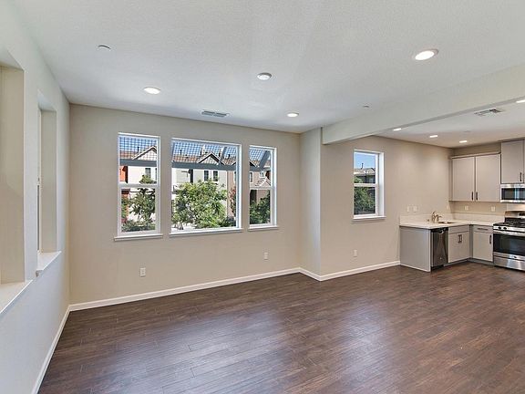 Corner unit with lots of natural light throughout