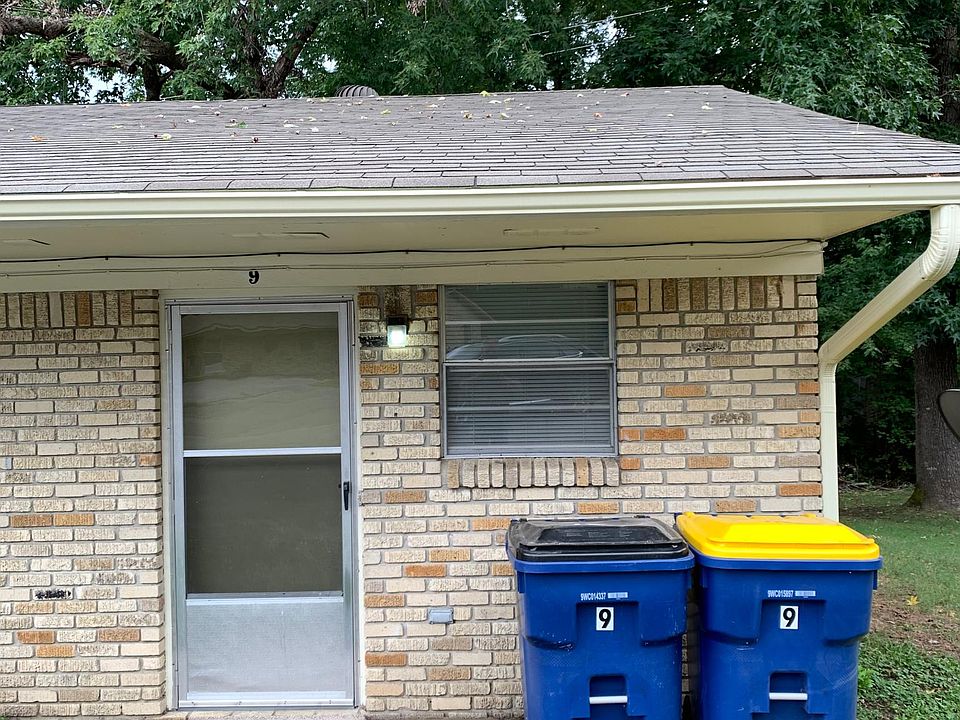 One bedroom duplex with storm door on front and side entrance.