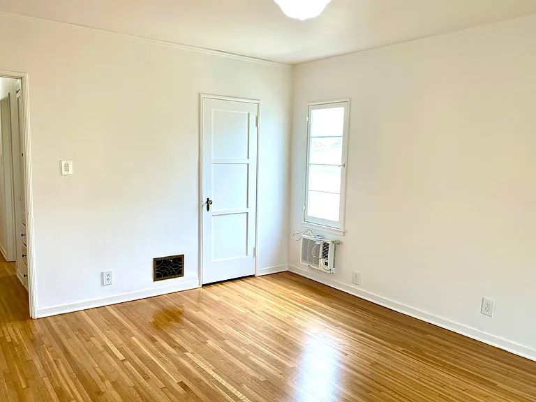 bedroom with walk-in closet