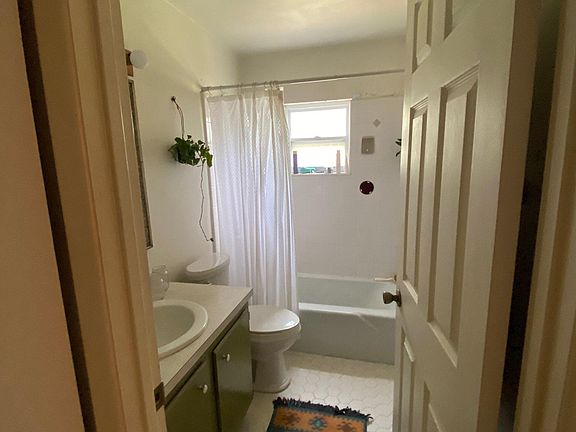 Bathroom with tub/ shower combo.