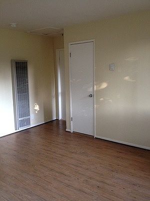 Faux wood flooring; courtyard view