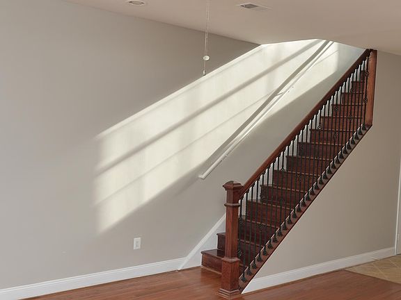 wooden stairs to the second floor