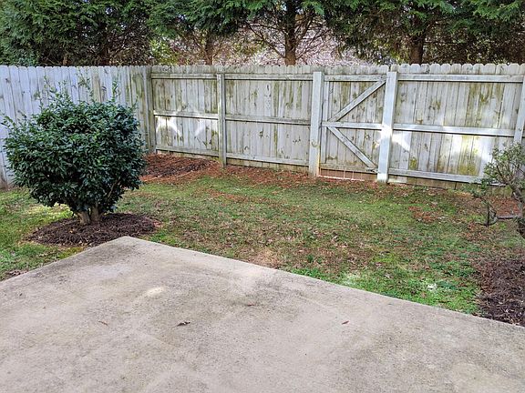 Private, fenced in backyard and patio