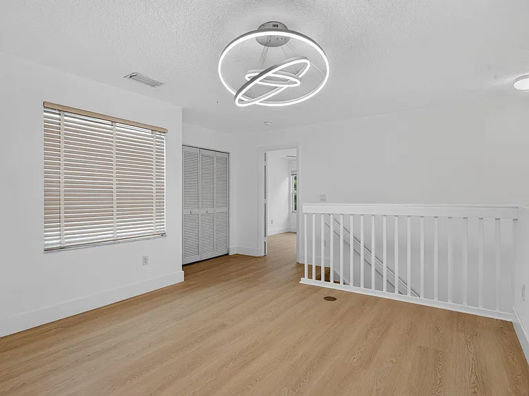 7087 NW 78th Pl — Photo 29