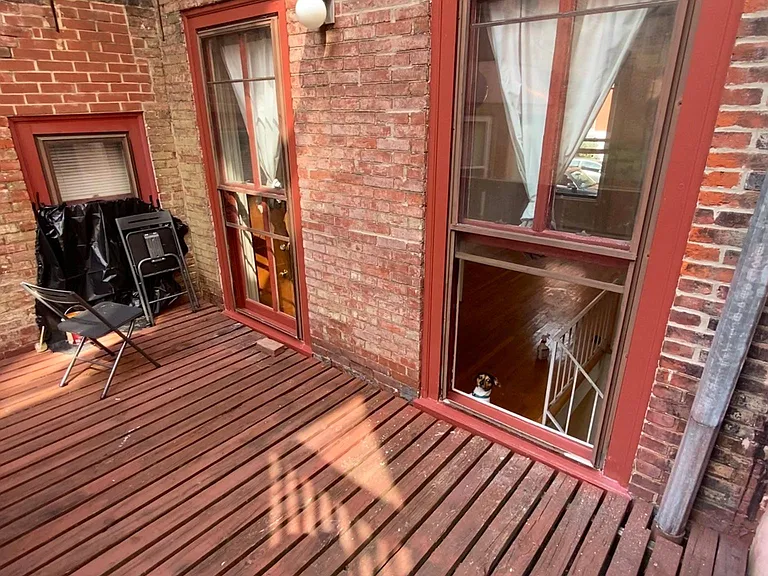 ANOTHER VIEW OF THE DECK,the two windows are part of the apartment