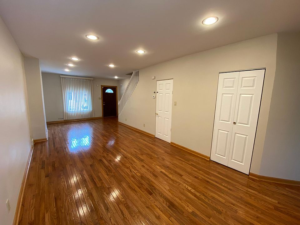 Main level : Open Living and Dining rooms with hardwood floors