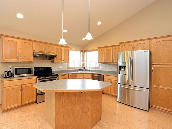 Kitchen with Island and Vaulted Ceilings