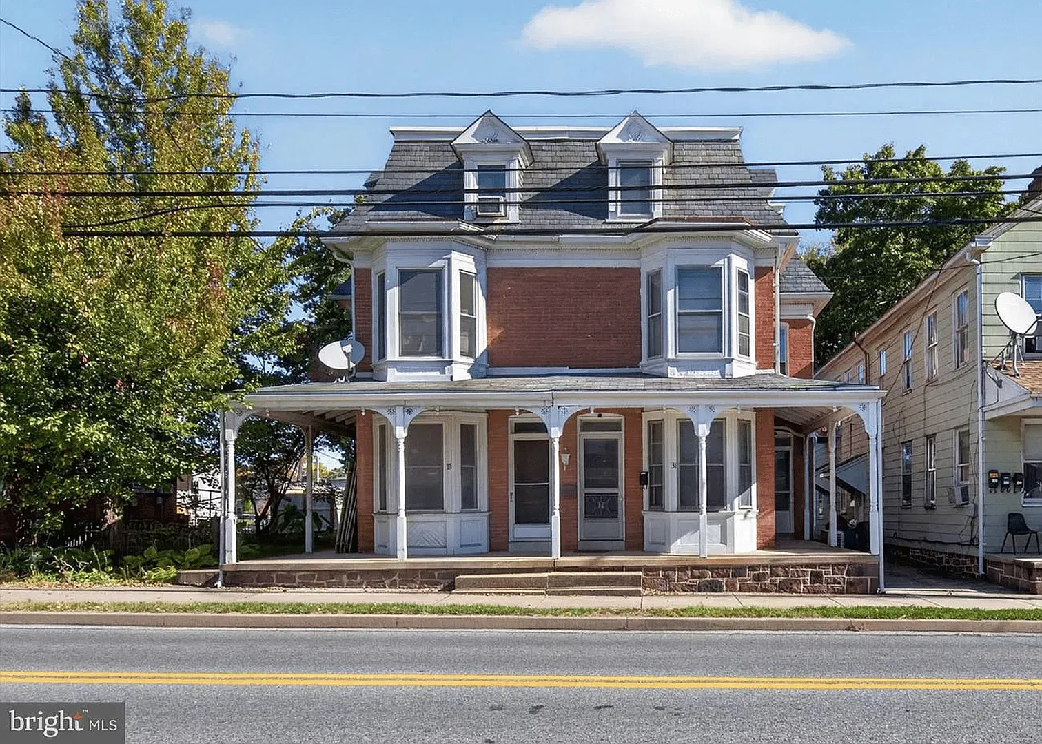 Welcome to 31 N Main Street, a beautifully renovated four-bedroom, two-bathroom home located in t... — Photo 1