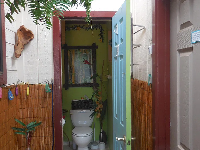 exit Laundry room (Tan) Door, to access shared Bathroom (1 other F. long term tenant works alot).