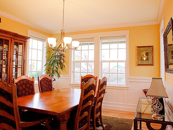 Formal dinning room with elegant wainscoting 