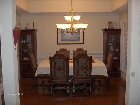 Elegant Dining with chair rail and trey ceiling
