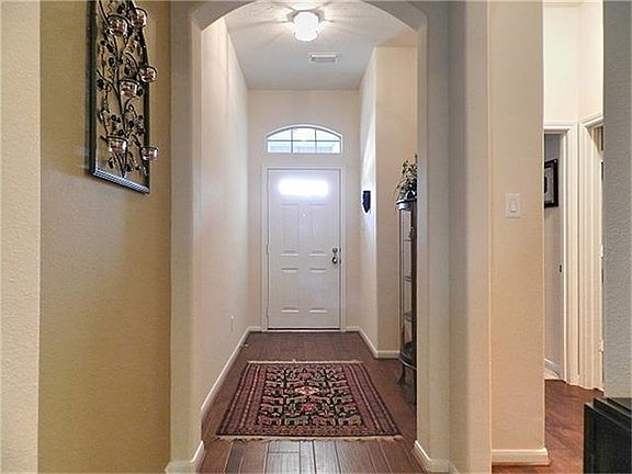 Distressed hard wood floors throughout.