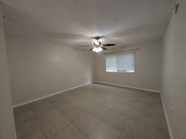 5011 Wiles Rd #208 — Photo 9