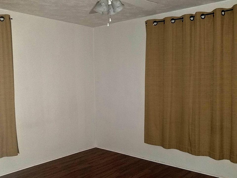 part of bedroom one, new floors and paint...