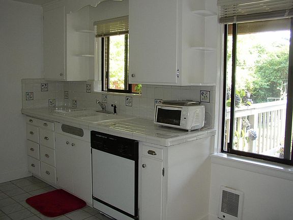 sun-filled kitchen with eat in space
