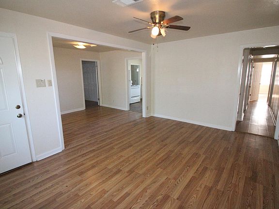 Living/Dining with site of hallway and kitchen