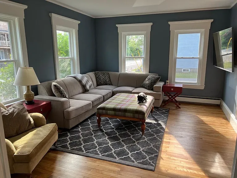 Living room with Queen size pullout bed and large TV