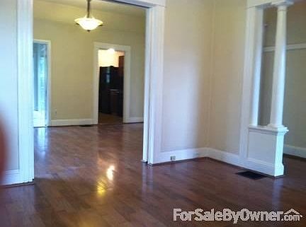 Large Living Room
						:
						Pocket doors between the rooms. 10' Ceilings.