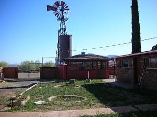 Back yard, BBQ hut and windmill