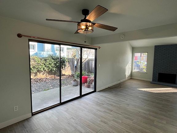Side patio, Dining and Living Room