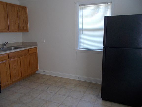 Large window in kitchen to allow natural lighting
