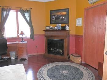 Den or 4th bedroom with hardwood floor