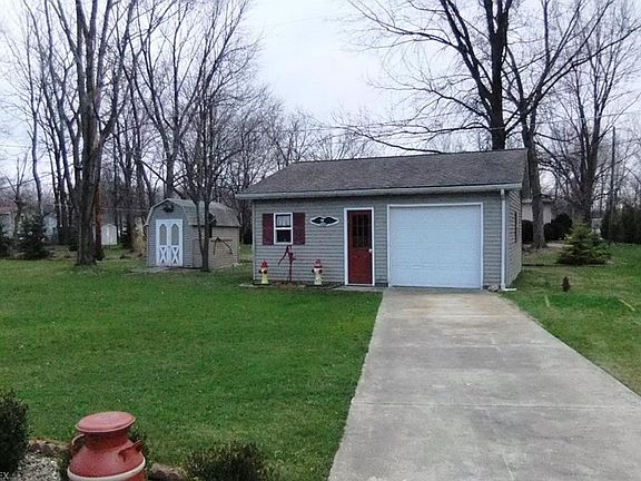 24x24 Building that is heated, A/C, office and overhead door and its own separate driveway.