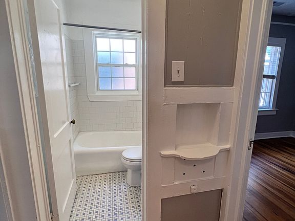 Classic tile bathroom and telephone nook!