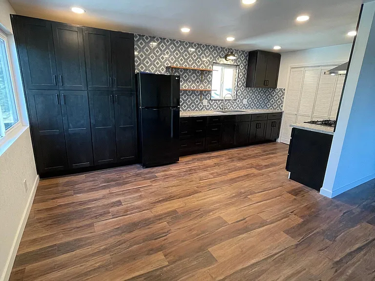 Large dining area with recessed lights.