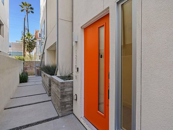 Rooftop views with plush outdoor seating and a 6-person dining space
Let the private Main Entrance welcome you home!
