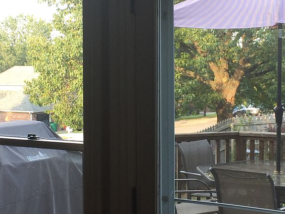 Large deck & tall windows