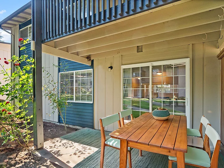 Experience relaxation and beauty on this charming patio, perfect for outdoor dining. Experience relaxation and beauty on this charming patio, perfect for outdoor dining.
