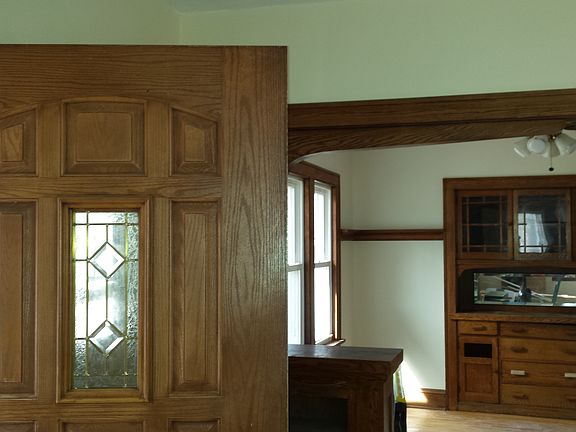 Living Room Front Door and Dining Room