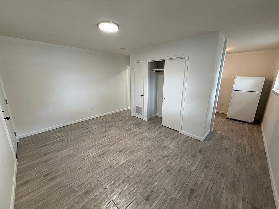 Kitchen right, closet center, bathroom left